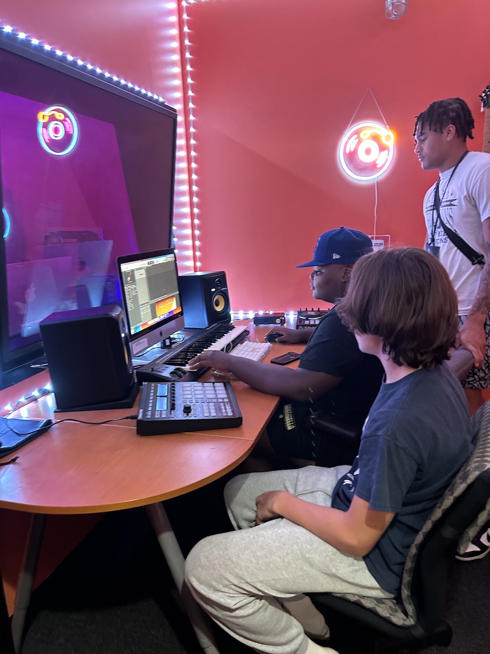 Students in a music production studio