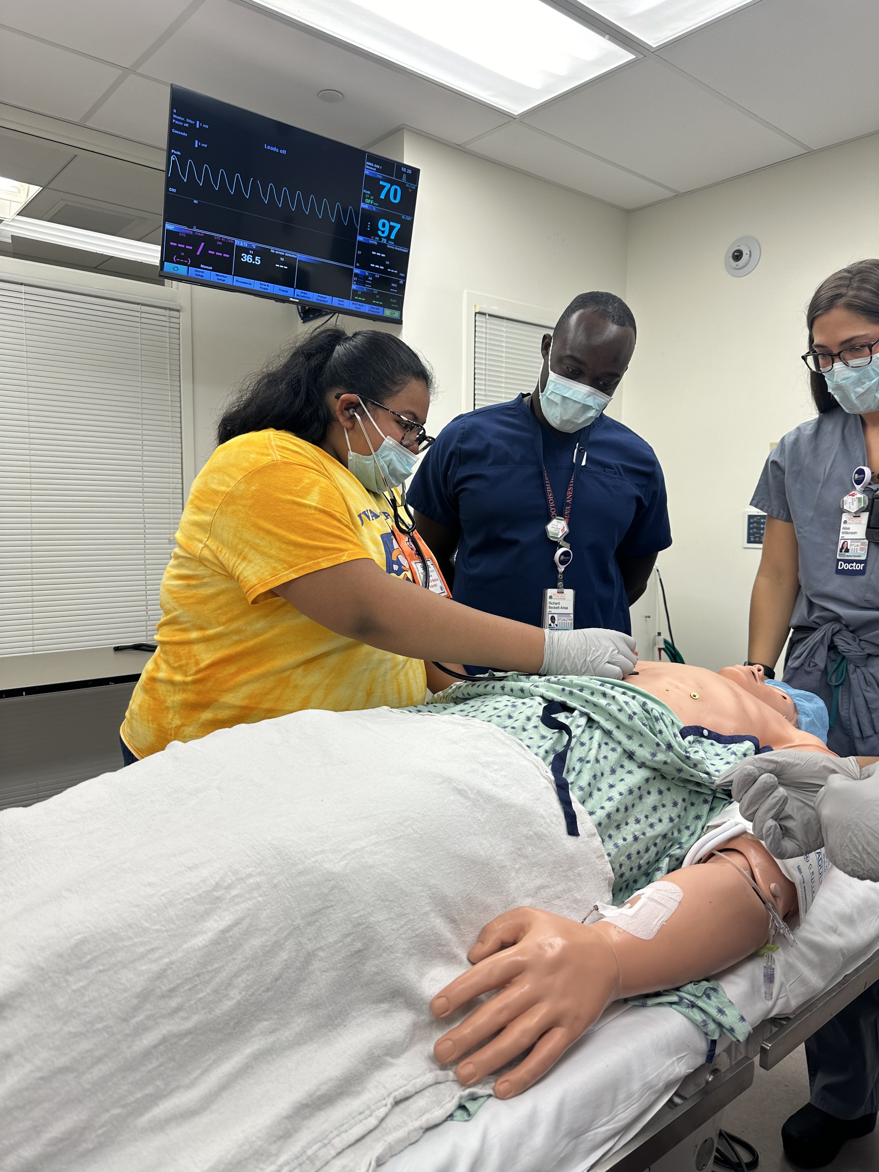 Student demonstrates chest compressions