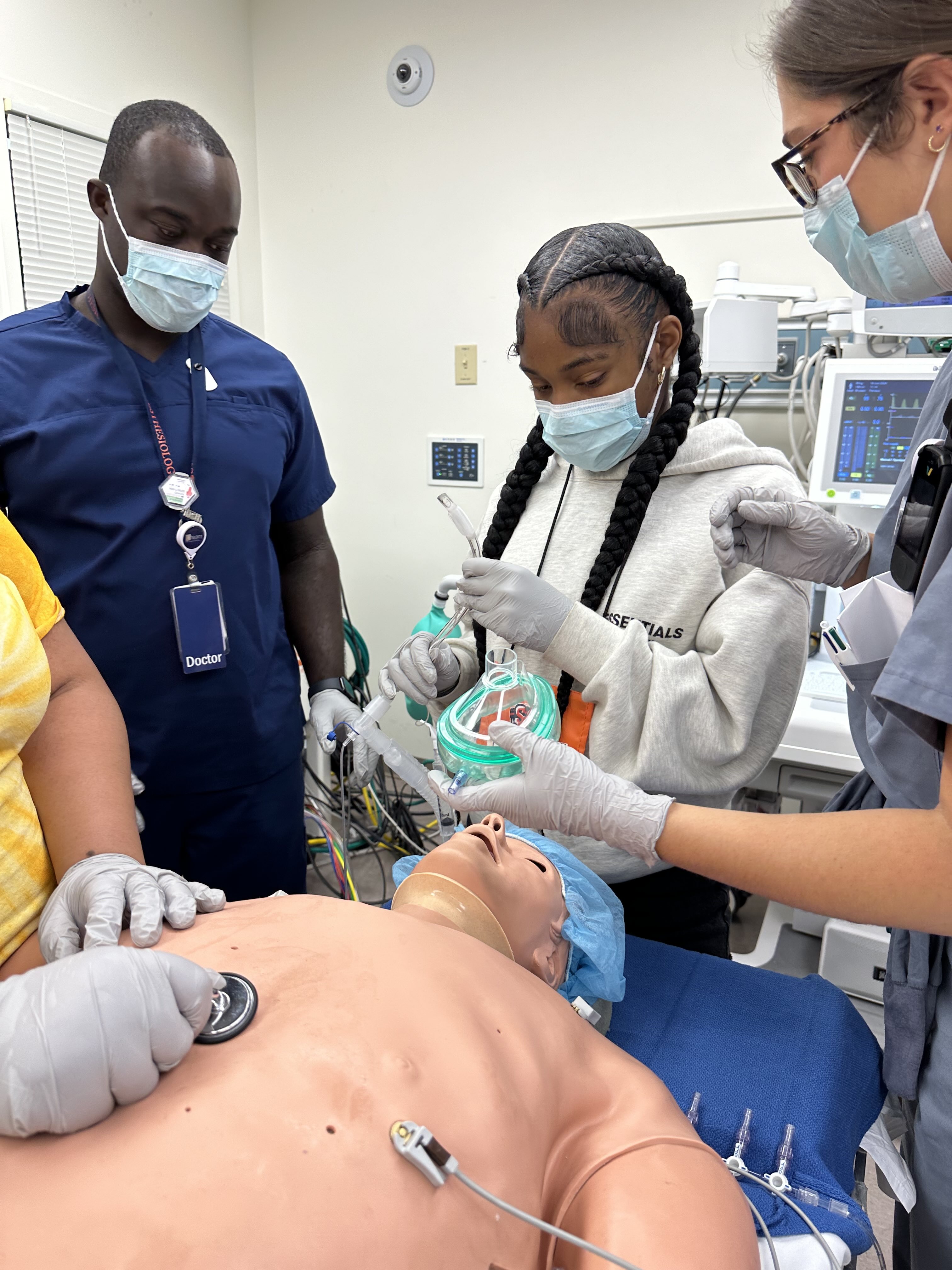 Counselor places a respiratory device 