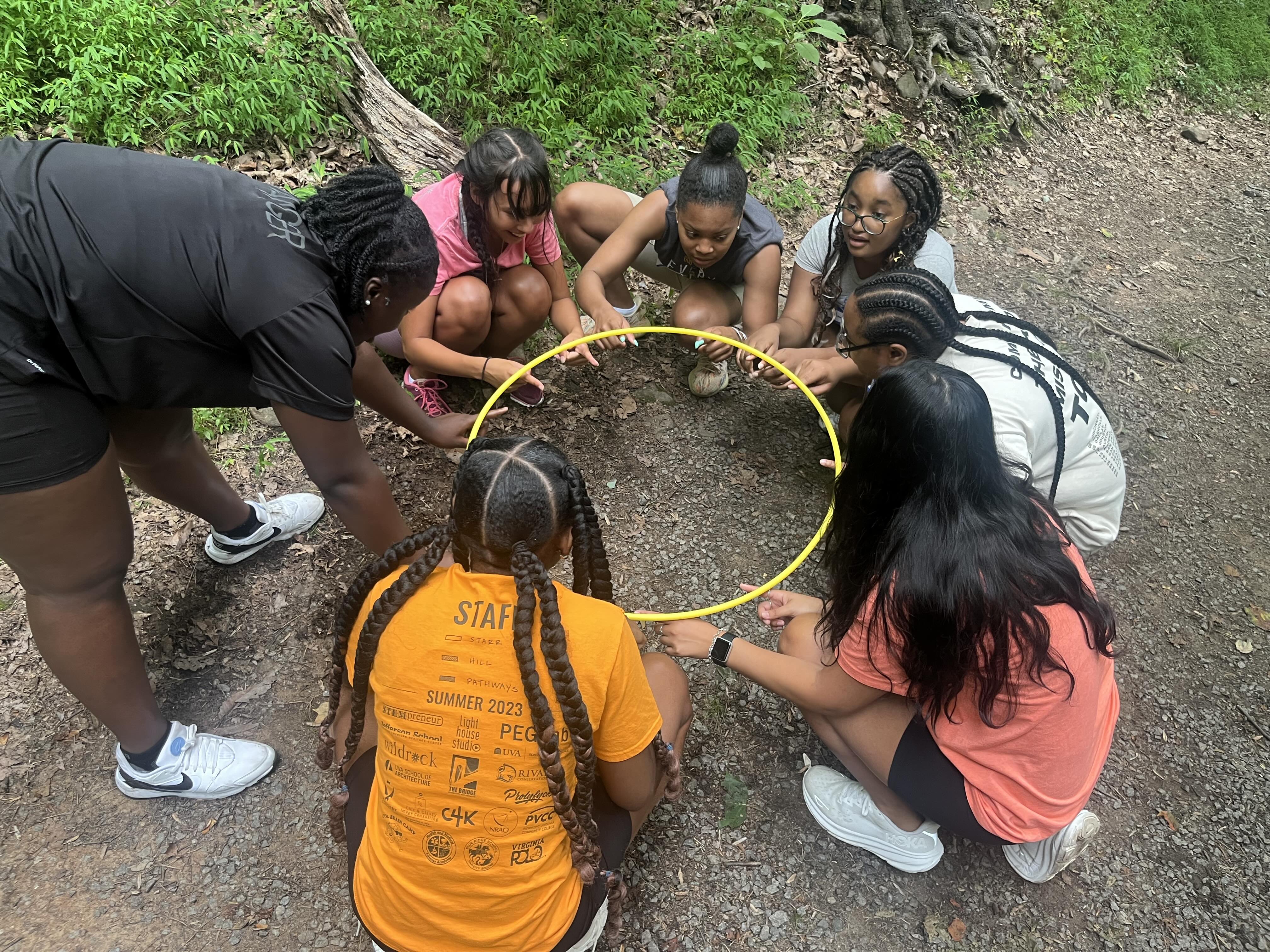 counselors participate in a trust exercise 