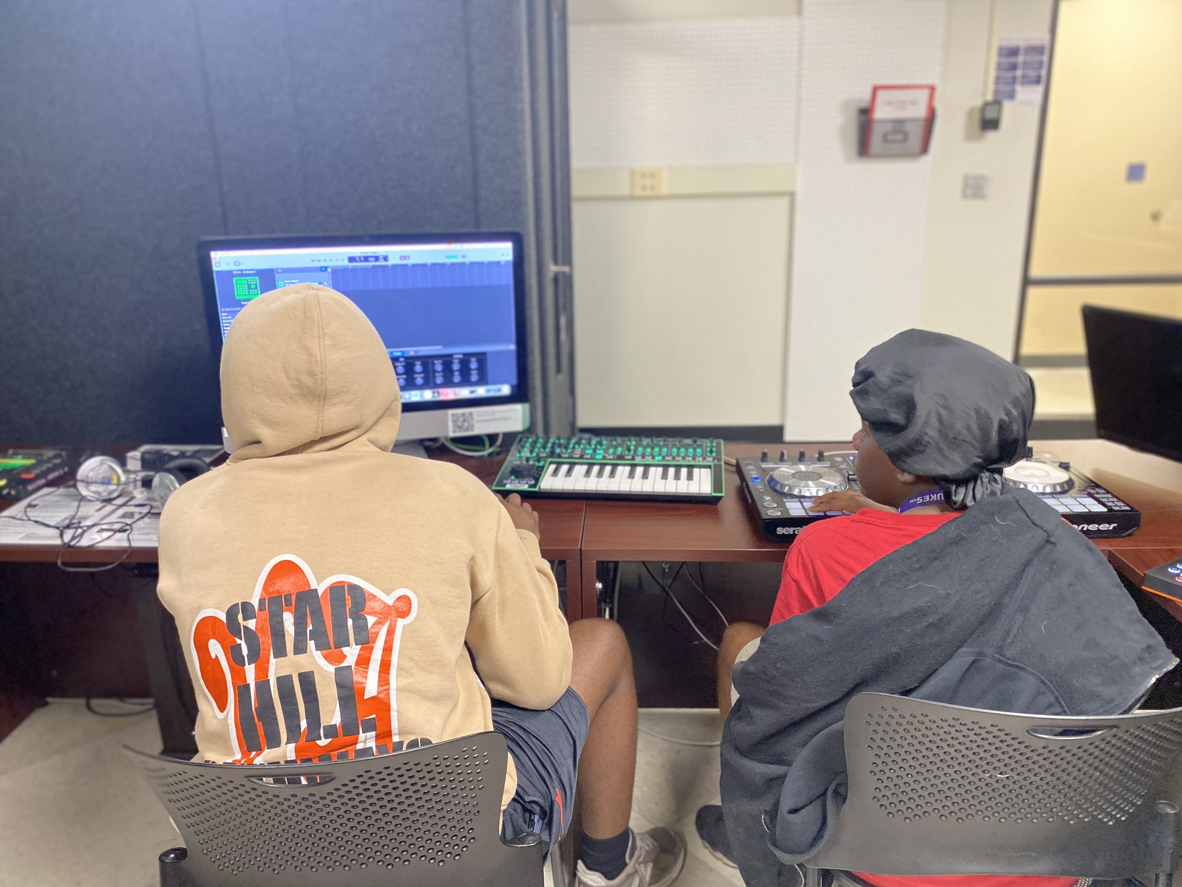 Students mix sound in the studio