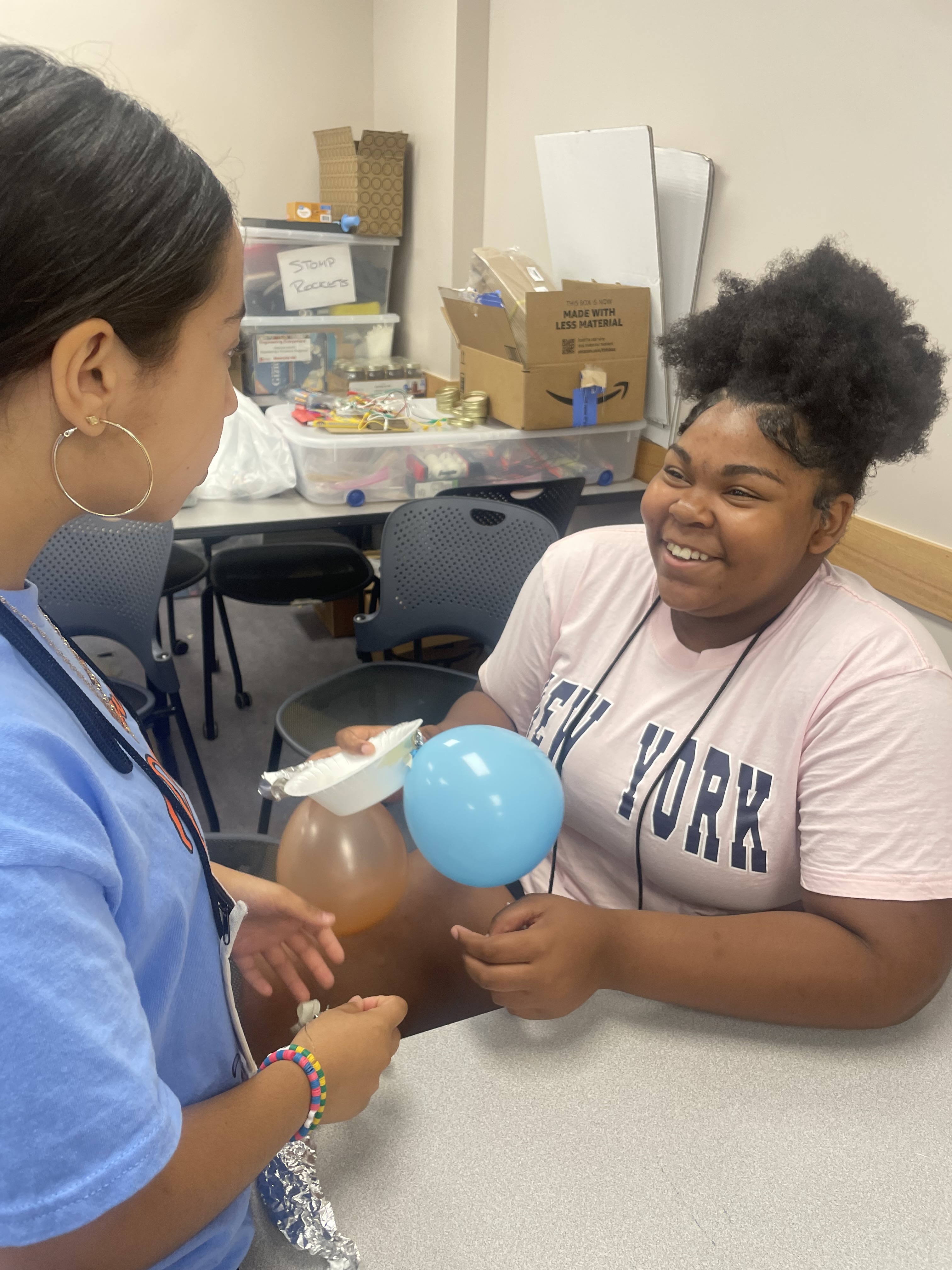 Students collaborate on balloon model 